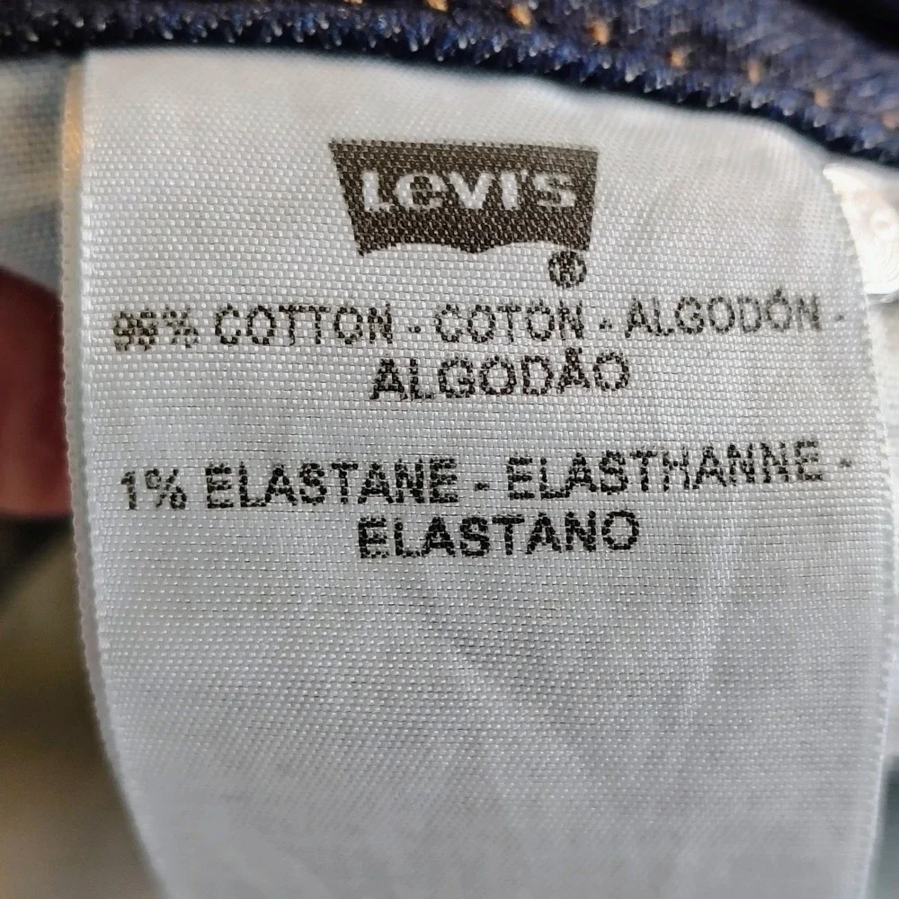 Levis 542 Flare Jeans Women 22M Dark Wash Blue Denim Distressed Hem Mid Rise y2k